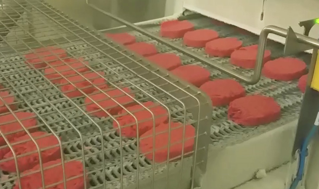 Loading of blast freezer, placement of ground beef patty