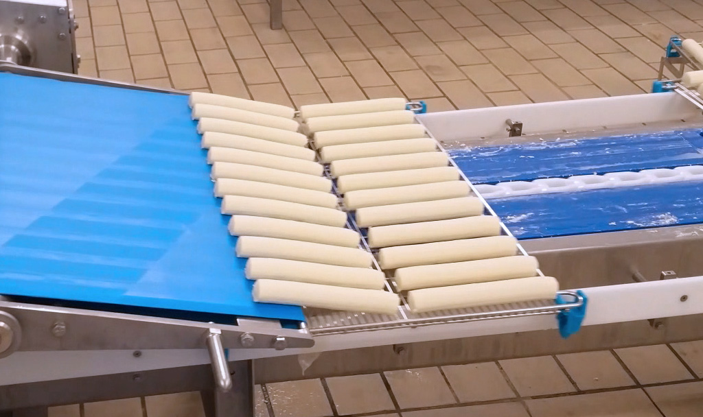 Placing Cheese Logs on Racks